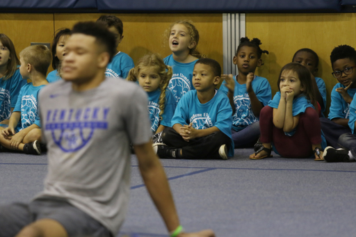 The UK men's basketball team delivered packed lunches to students at local elementary schools Friday as a part of the God's Pantry program.