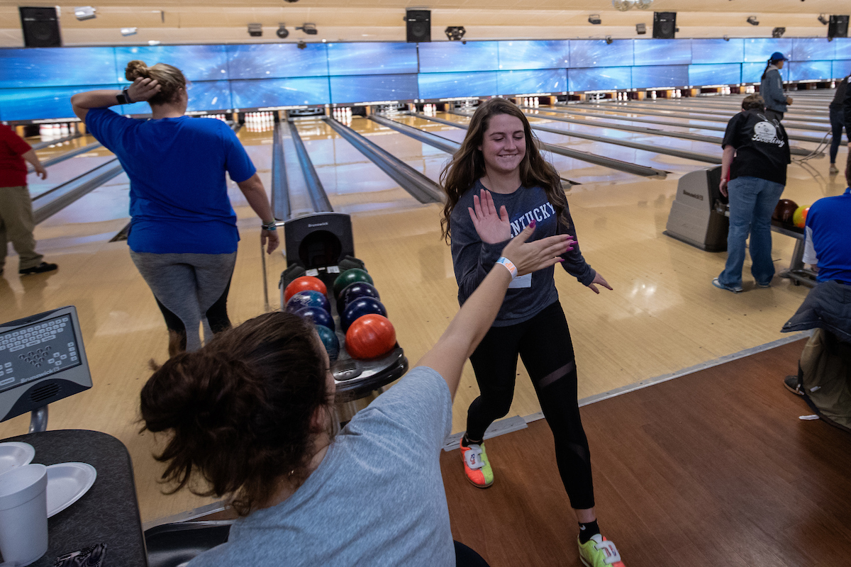 UK athletes bowl with members of Special Olympics at Collins Bowling Alley on , Saturday Dec. 8, 2018  in Lexington, Ky. Photo by Mark Mahan