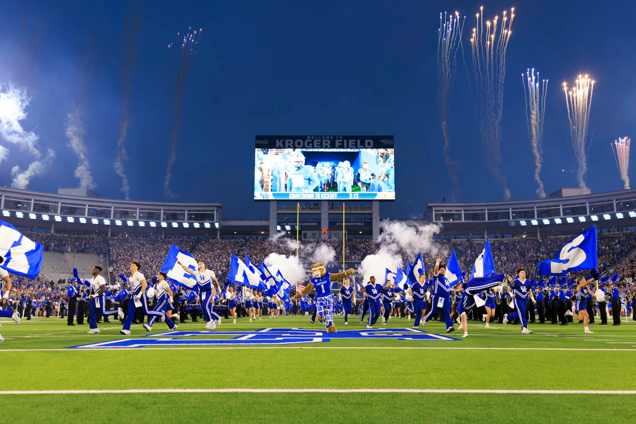 Scratch, the wildcat running out on Kroger Field.