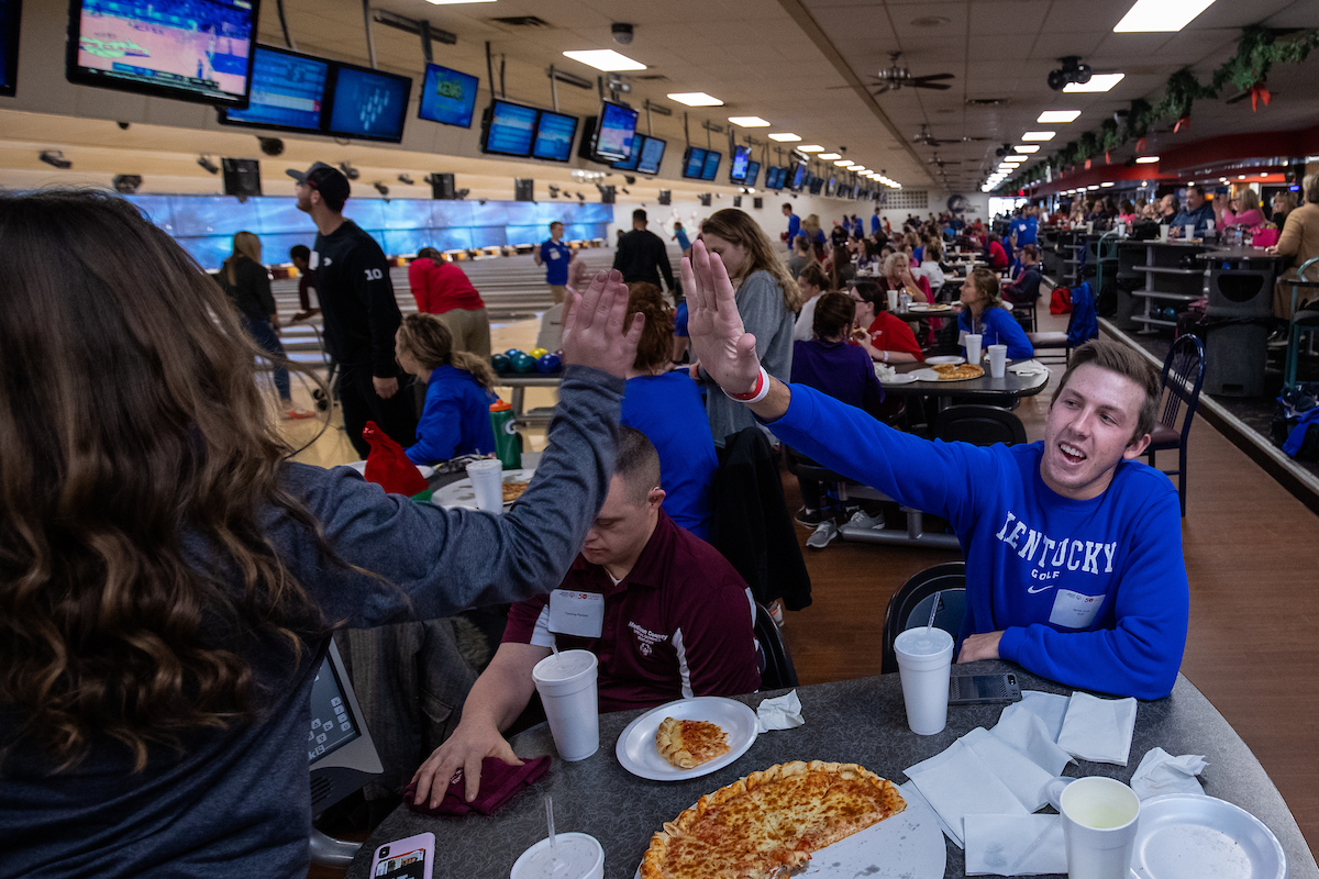 UK athletes bowl with members of Special Olympics at Collins Bowling Alley on , Saturday Dec. 8, 2018  in Lexington, Ky. Photo by Mark Mahan