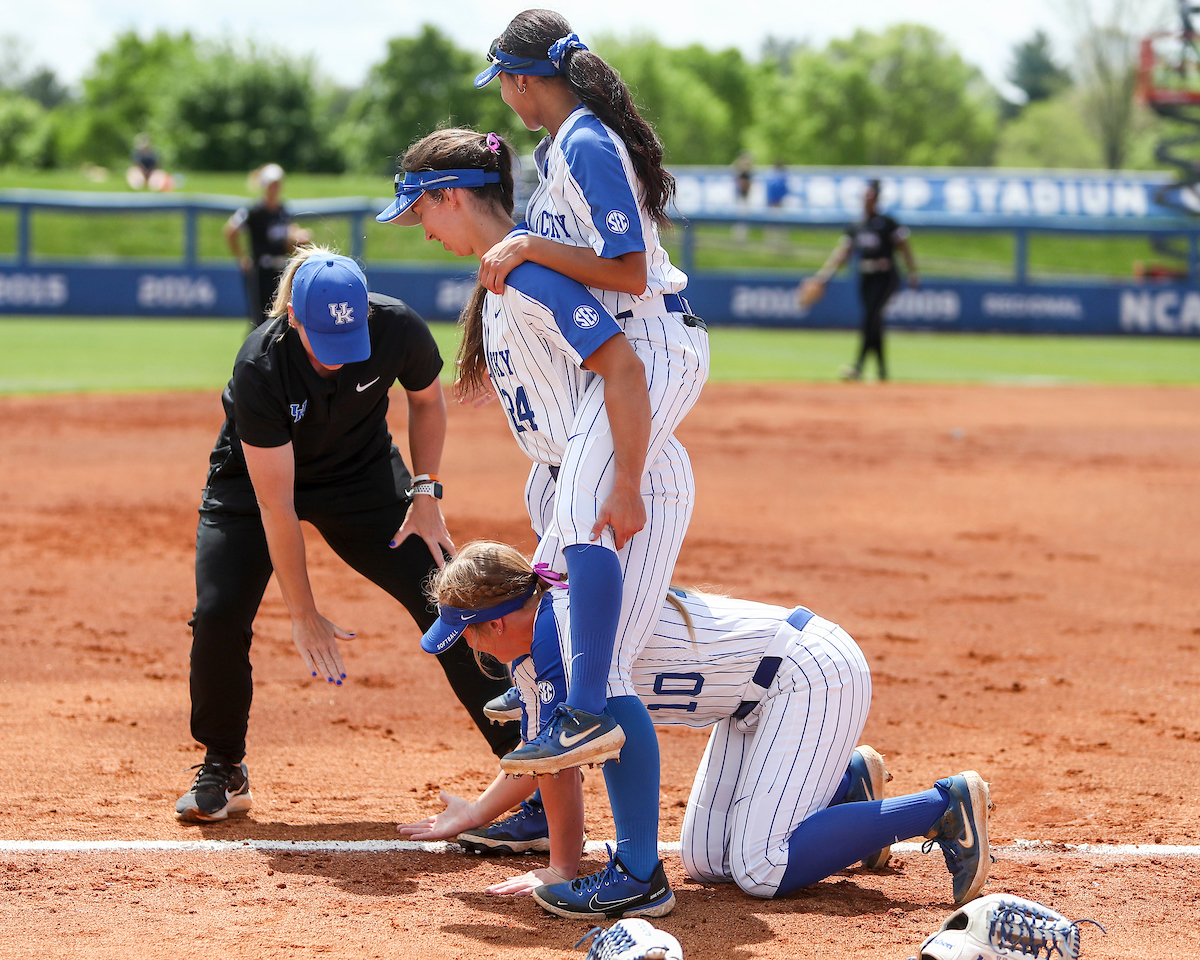 Jenna Blanton. Emma Boitnott. Vanessa Nesby. Coach Kristine Himes.

Kentucky defeats Mississippi State 9-5.

Photo by Sarah Caputi | UK Athletics