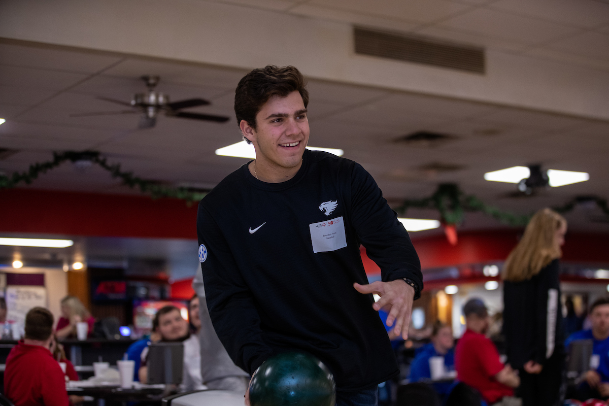 UK athletes bowl with members of Special Olympics at Collins Bowling Alley on , Saturday Dec. 8, 2018  in Lexington, Ky. Photo by Mark Mahan