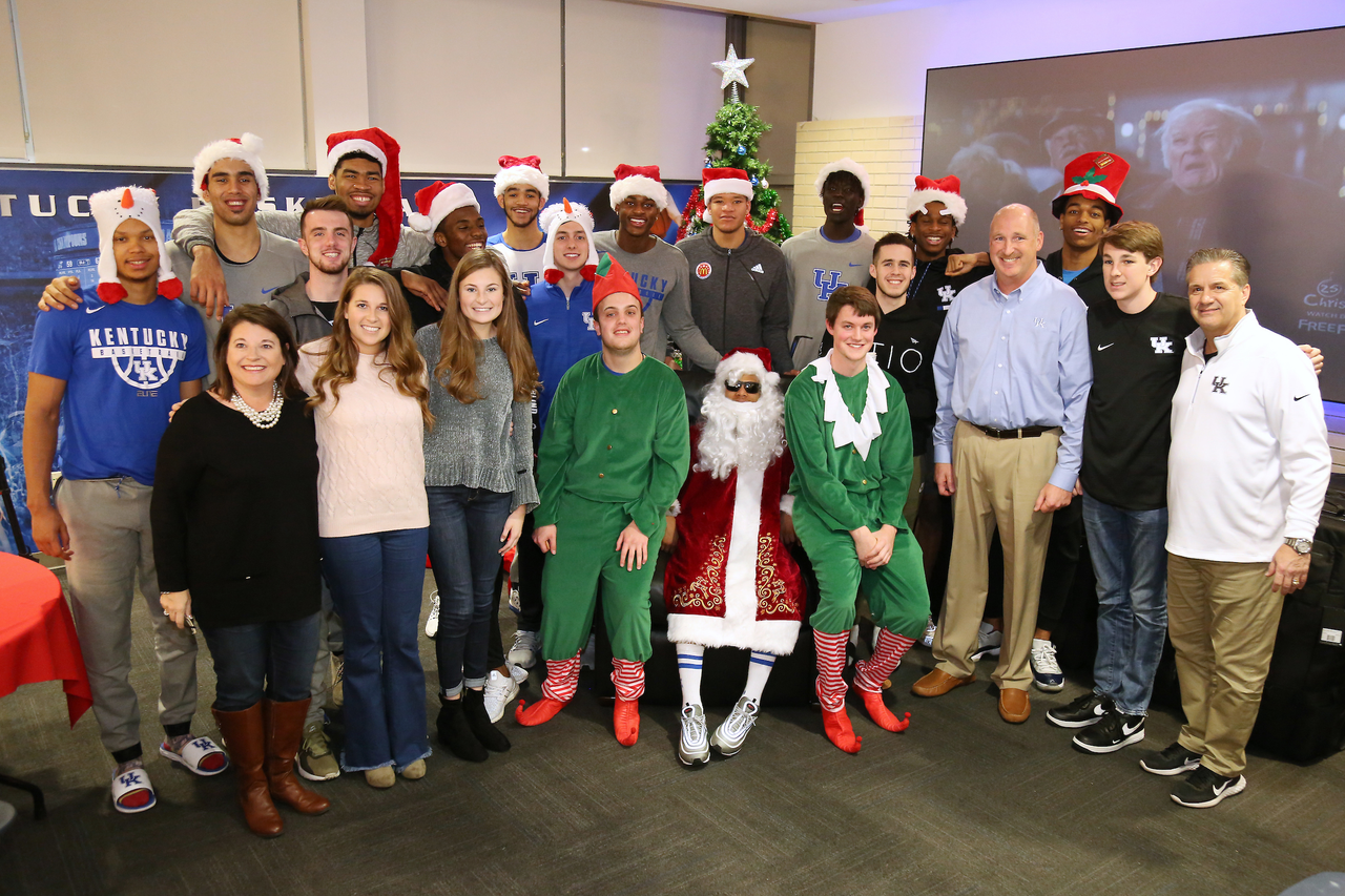 The Kentucky men's basketball team delivered an early Christmas to 10 families in Lexington. 