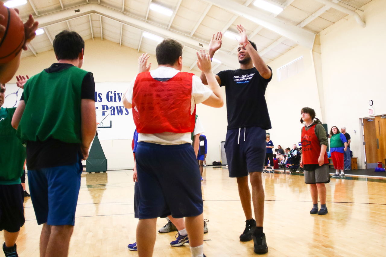 EJ Montgomery. Celebration. 

EJ Montgomery and Immanuel Quickley play basketball with with kids during a camp at Winstar Farm on Thursday, June 20th. 

Photo by Eddie Justice | UK Athletics