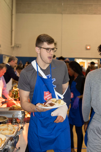 The Kentucky men's basketball team served food at the Salvation Army on Thanksgiving. 