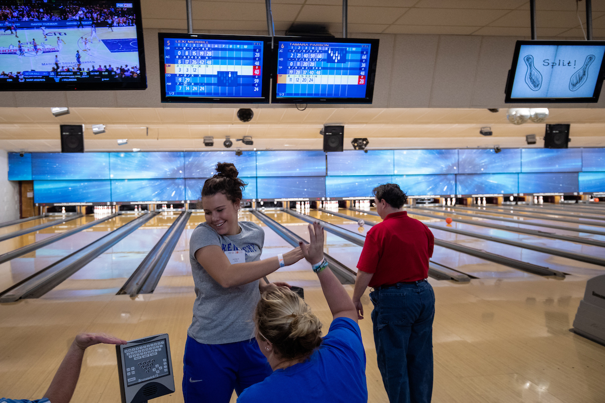 UK athletes bowl with members of Special Olympics at Collins Bowling Alley on , Saturday Dec. 8, 2018  in Lexington, Ky. Photo by Mark Mahan