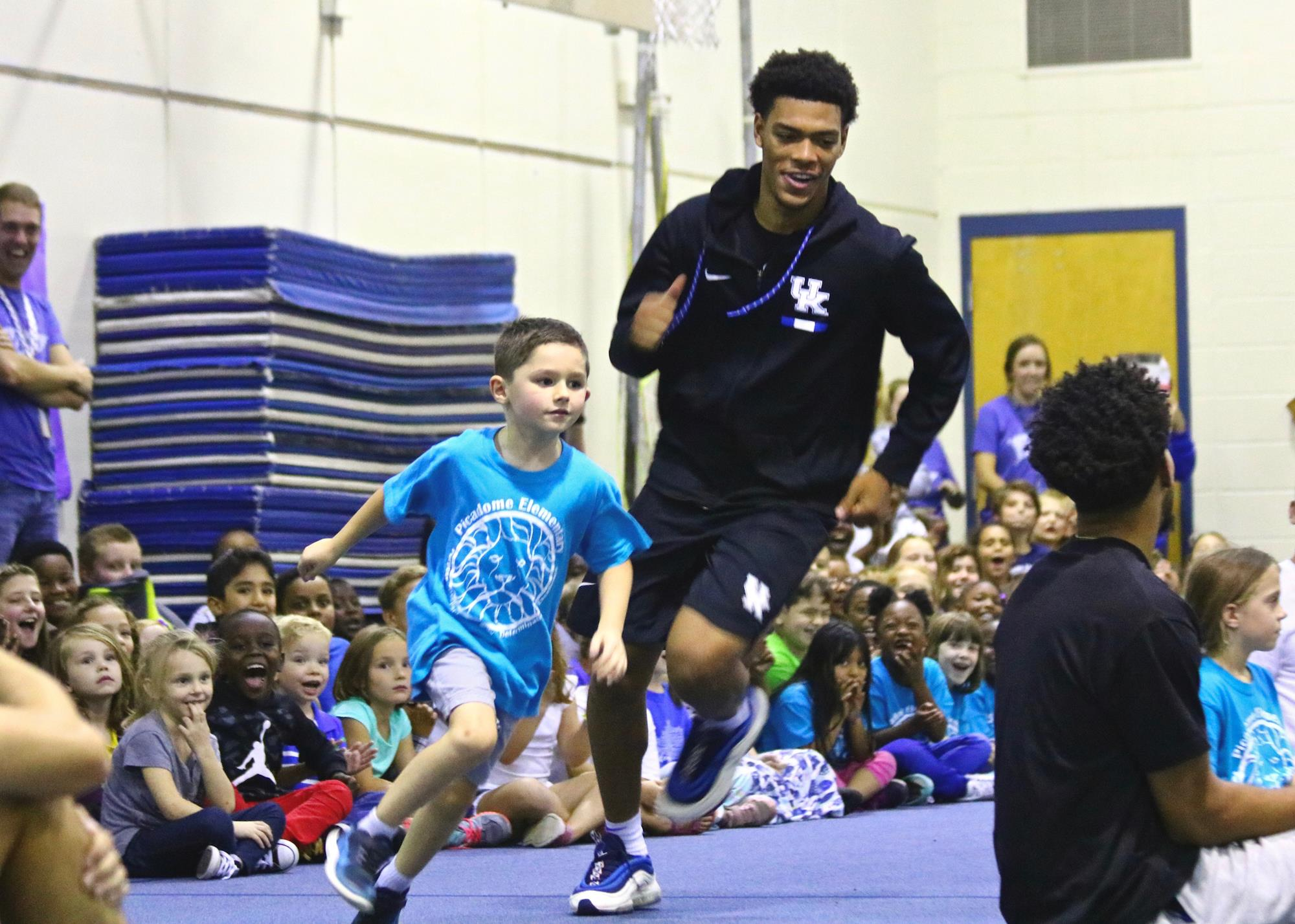 Cats Deliver Lunches, Fun to Local Elementary Students