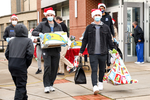 Riley Welch.

Kentucky men's basketball gives back for the holidays.

Photo by Eddie Justice | UK Athletics
