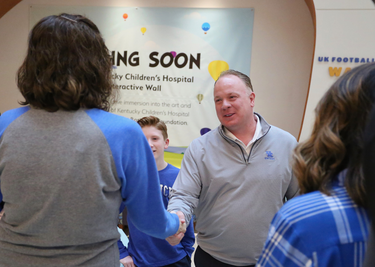 Mark Stoops.

Sarah Howard and her family are presented with a vacation trip to the 2019 VRBO Citrus Bowl to cheer on the Kentucky Wildcats.

Photo by Noah J. Richter | UK Athletics