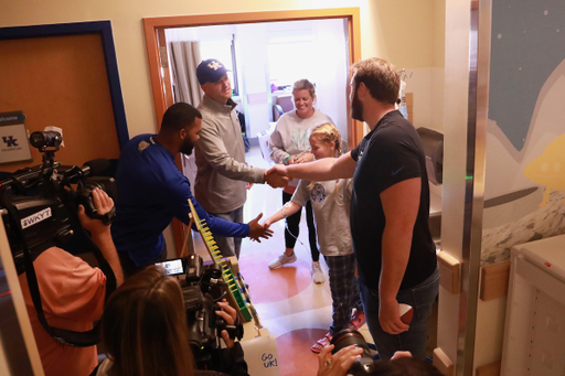 Football players participate in KCH Homecoming Parade.

Photo by Noah J. Richter | UK Athletics