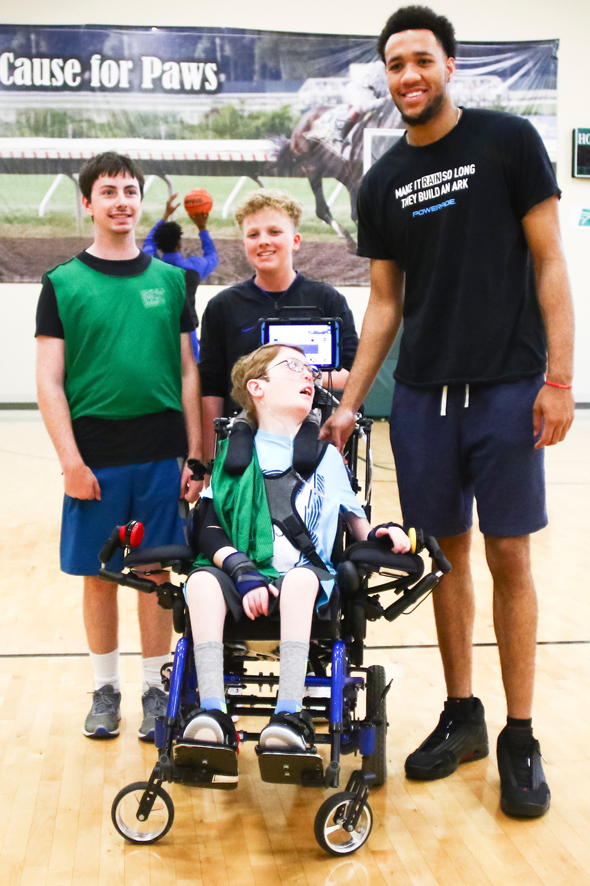 EJ Montgomery. Fan. 

EJ Montgomery and Immanuel Quickley play basketball with with kids during a camp at Winstar Farm on Thursday, June 20th. 

Photo by Eddie Justice | UK Athletics