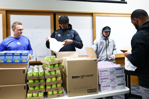 Jackson High. Deondre Buford. Tyler Beisner.

Kentucky football players pack lunches for God’s Pantry Food Bank.

Photo by Elliott Hess | UK Athletics