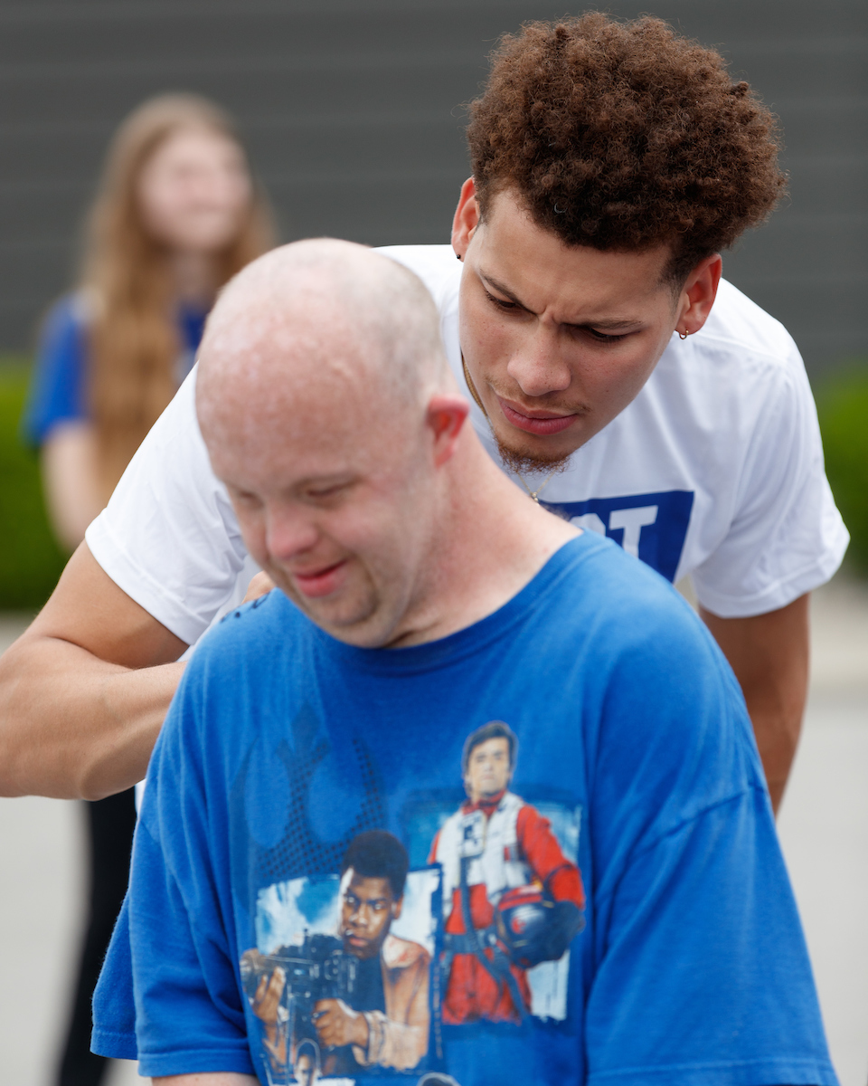 Kellen Grady. 

Some of the Kentucky men's basketball team visited the Pillar Community Engagement Center on Tuesday in Crestwood, Kentucky.

Photo by Elliott Hess | UK Athletics