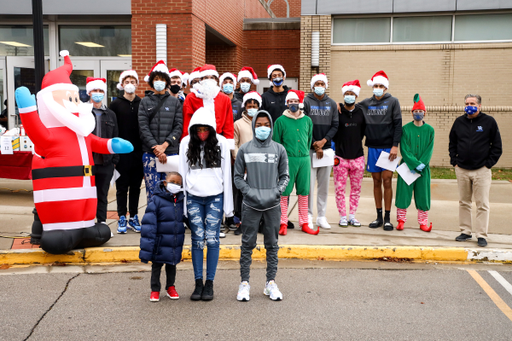 Family. 

Kentucky men's basketball gives back for the holidays.

Photo by Eddie Justice | UK Athletics