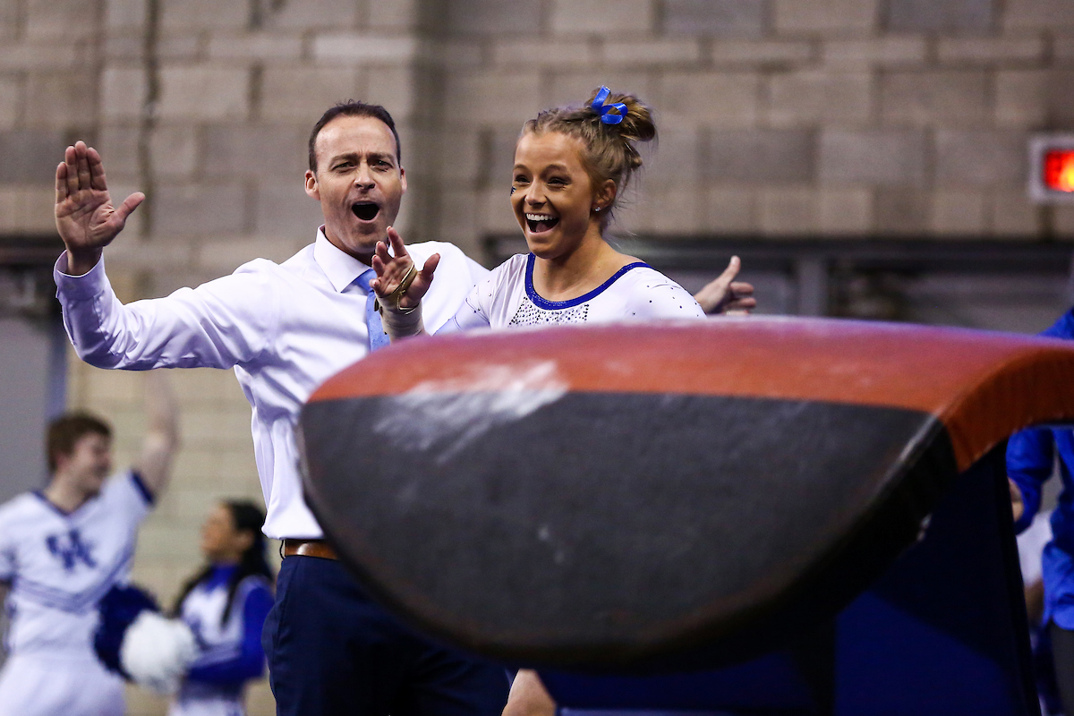 Mollie Korth and Coach Tim Garrison.

Kentucky falls to Georgia 197.050-196.825.

Photo by Sarah Caputi | UK Athletics