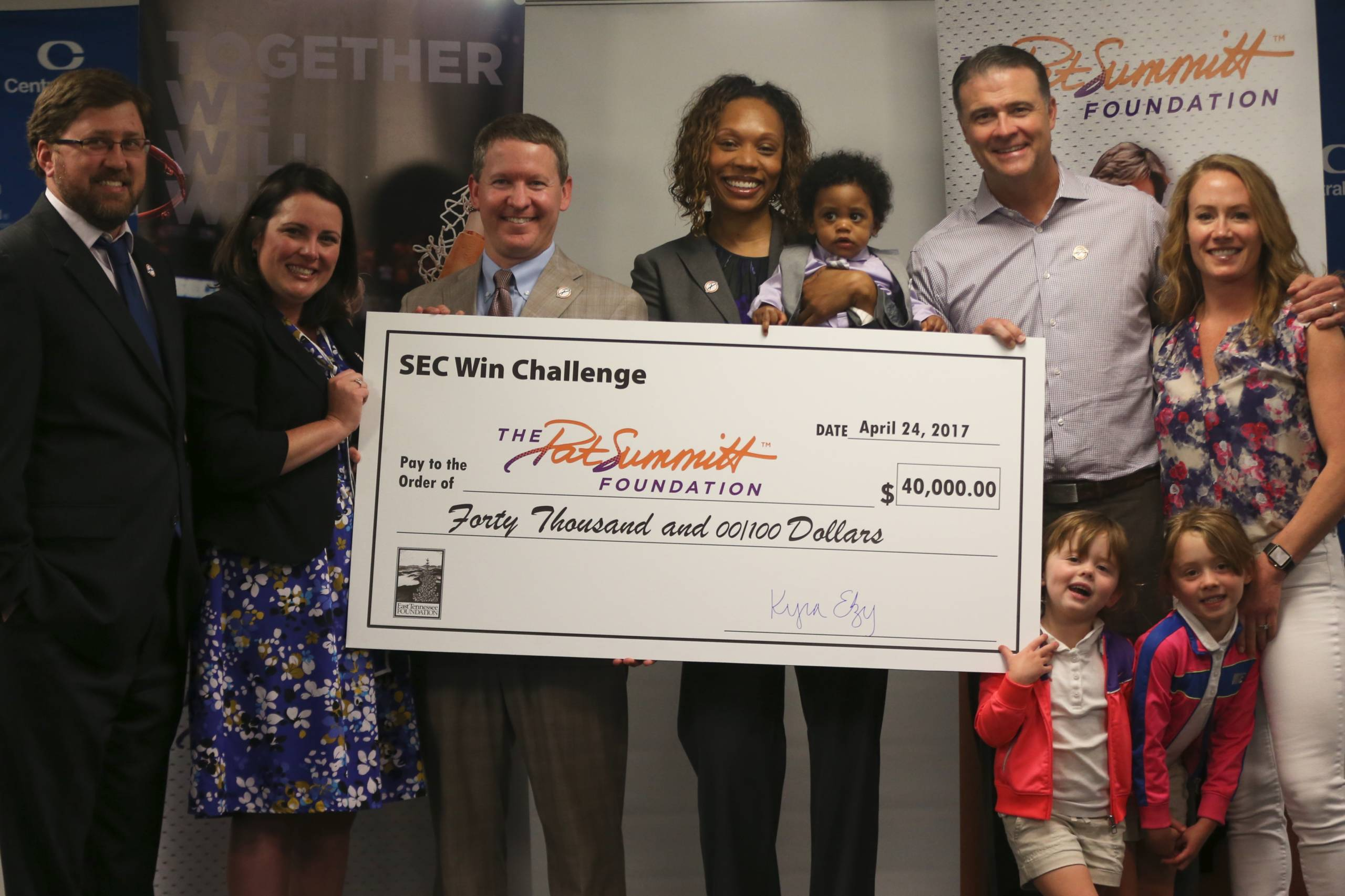 Elzy Presents SEC Win Challenge Check to The Pat Summitt Foundation