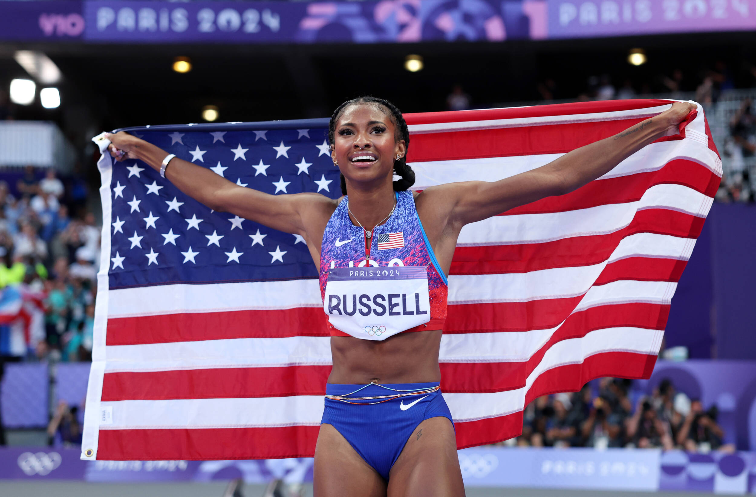 Masai Russell Wins Olympic Gold in 100m Hurdles, Two Wildcats Win Gold in 4x400m Relay