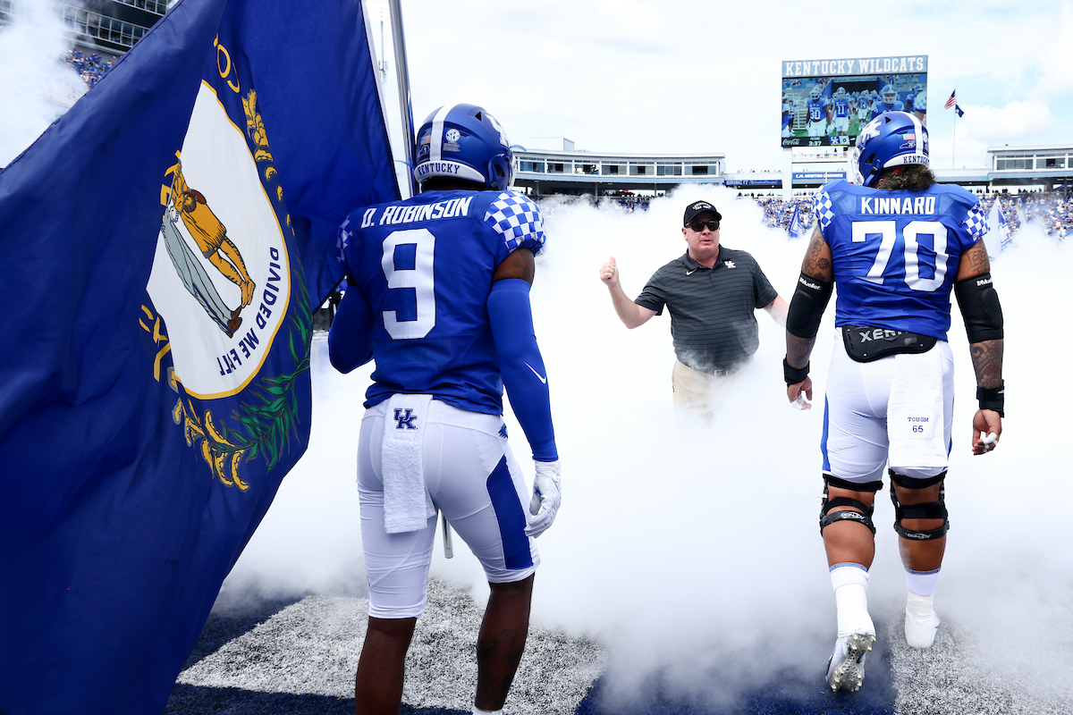 Darian Kinnard. Coach Mark Stoops. Davonte Robinson.

UK beats UTC, 28-23.

Photo by Elliott Hess | UK Athletics