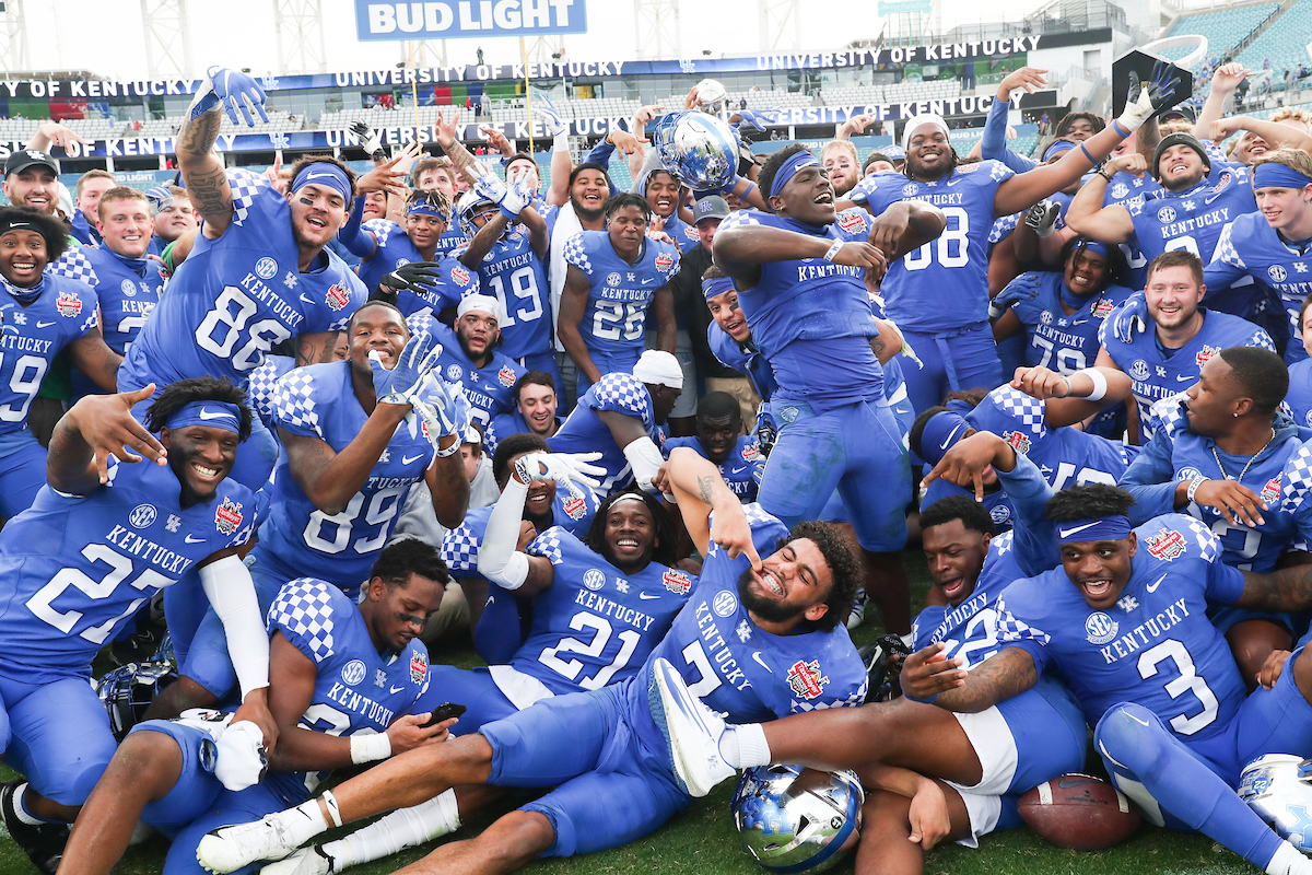 TEAM. COACH MARK STOOPS.

Kentucky beats NC State, 23-21, to win the TaxSlayer Gator Bowl.

Photo by Elliott Hess | UK Athletics