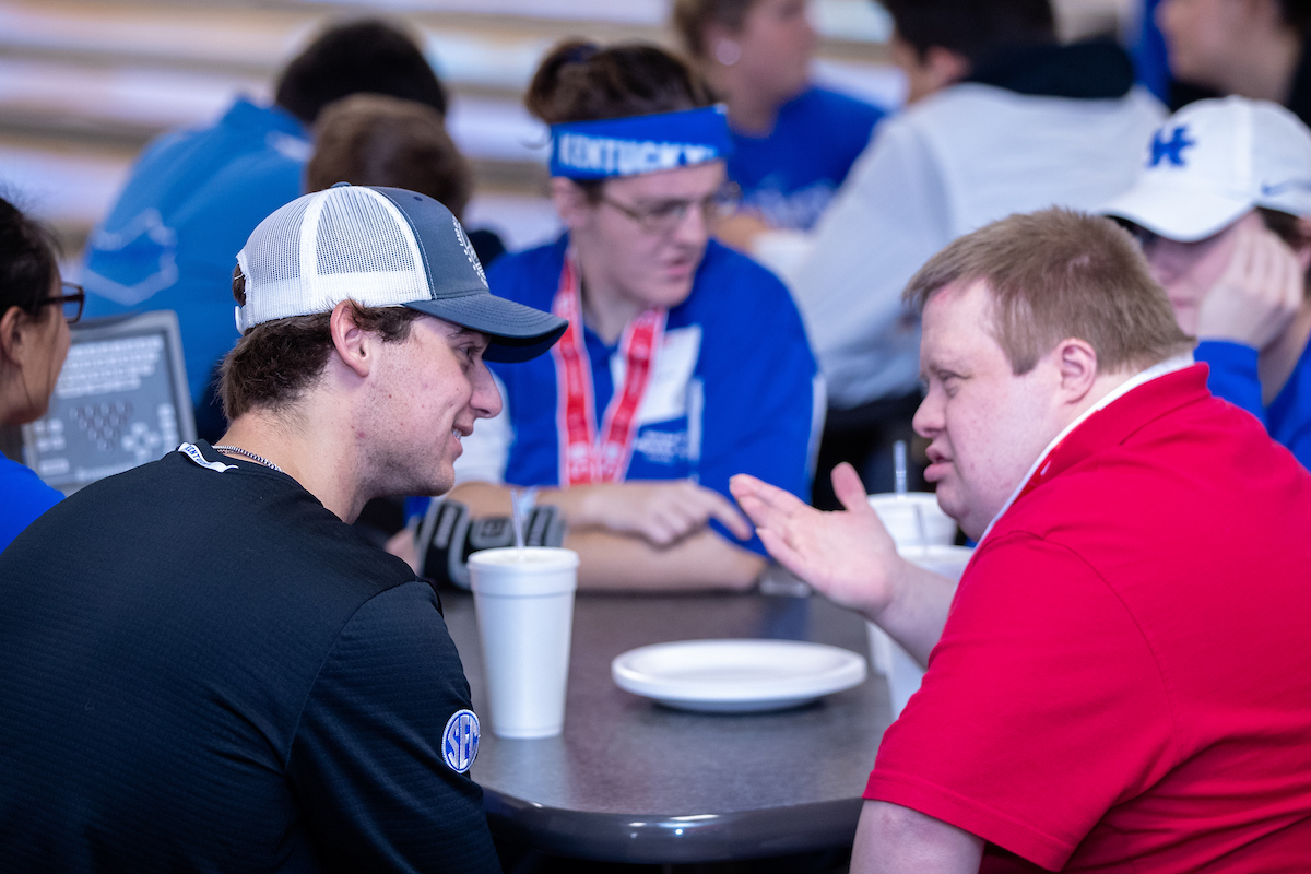 UK athletes bowl with members of Special Olympics at Collins Bowling Alley on , Saturday Dec. 8, 2018  in Lexington, Ky. Photo by Mark Mahan