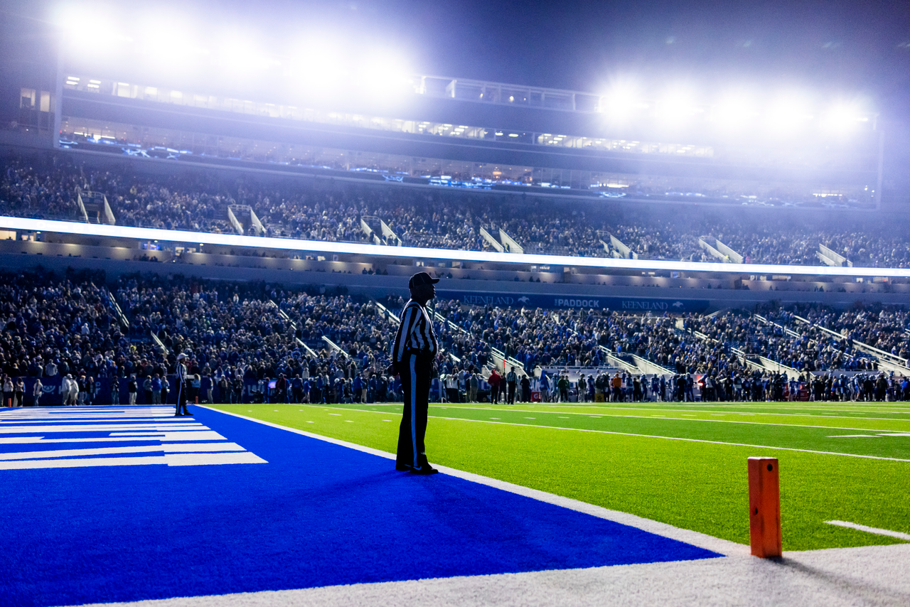 Referee standing in the Kentucky endzone.
