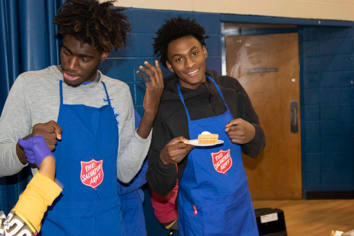 The Kentucky men's basketball team served food at the Salvation Army on Thanksgiving. 