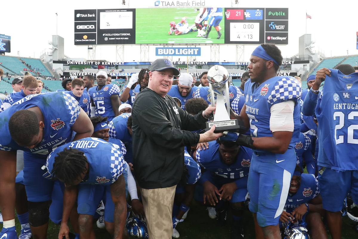 TEAM. COACH MARK STOOPS.

Kentucky beats NC State, 23-21, to win the TaxSlayer Gator Bowl.

Photo by Elliott Hess | UK Athletics