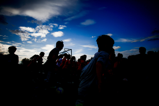 Fans. Sunset. 

Fans play with the Kentucky Men?s soccer team during fan day.

Photo by Eddie Justice | UK Athletics