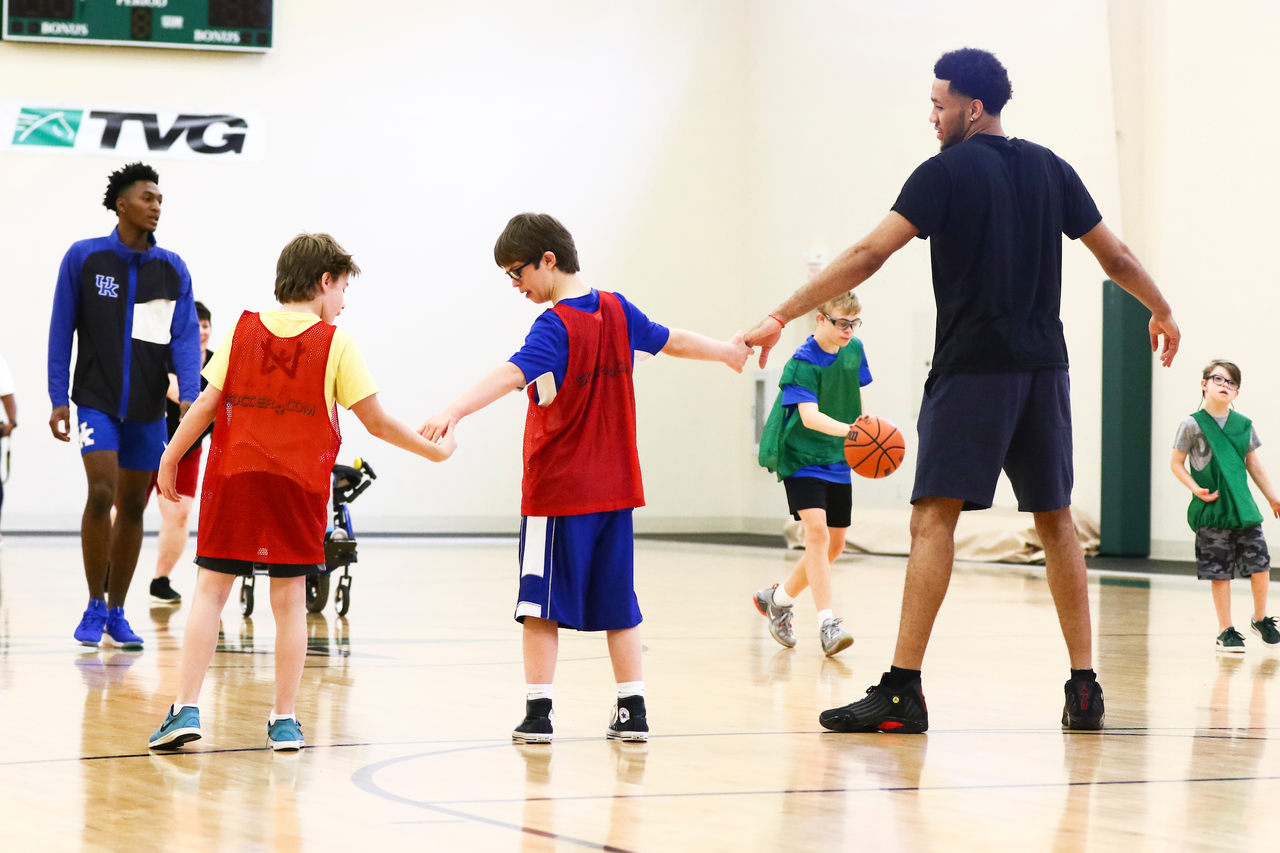 EJ Montgomery. 

EJ Montgomery and Immanuel Quickley play basketball with with kids during a camp at Winstar Farm on Thursday, June 20th. 

Photo by Eddie Justice | UK Athletics