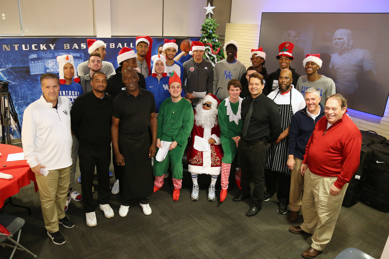 The Kentucky men's basketball team delivered an early Christmas to 10 families in Lexington. 