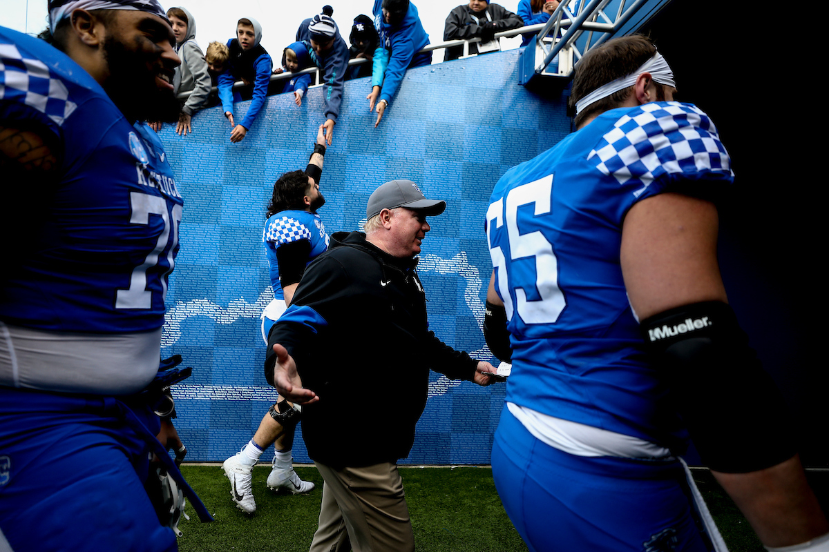 Mark Stoops. Austin Dotson. Darian Kinnard. Luke Fortner.

Kentucky beat New Mexico State 56-16.

Photos by Chet White | UK Athletics