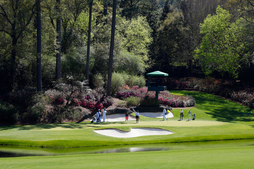 Latanna Stone of the United States, Aline Krauter of Germany and Jensen Castle of the United States play the No. 12 green during a practice round for the Augusta National Women's Amateur at Augusta National Golf Club, Friday, April 1, 2022.