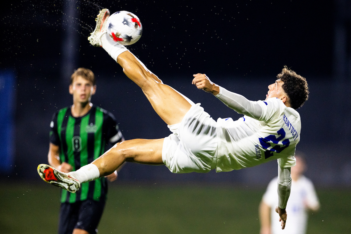 A picture of Costa Iliadis attempting a bicycle kick