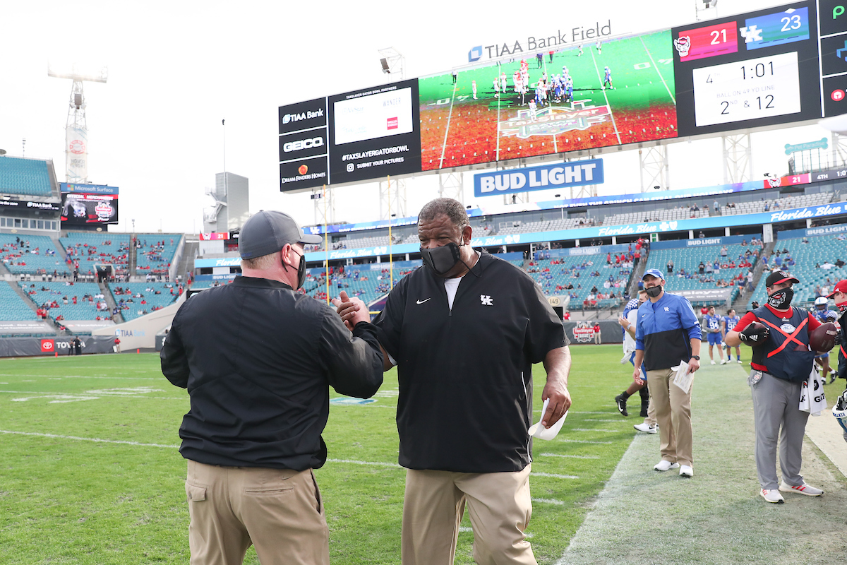 COACH MARK STOOPS. VINCE MARROW.

Kentucky beats NC State, 23-21, to win the TaxSlayer Gator Bowl.

Photo by Elliott Hess | UK Athletics