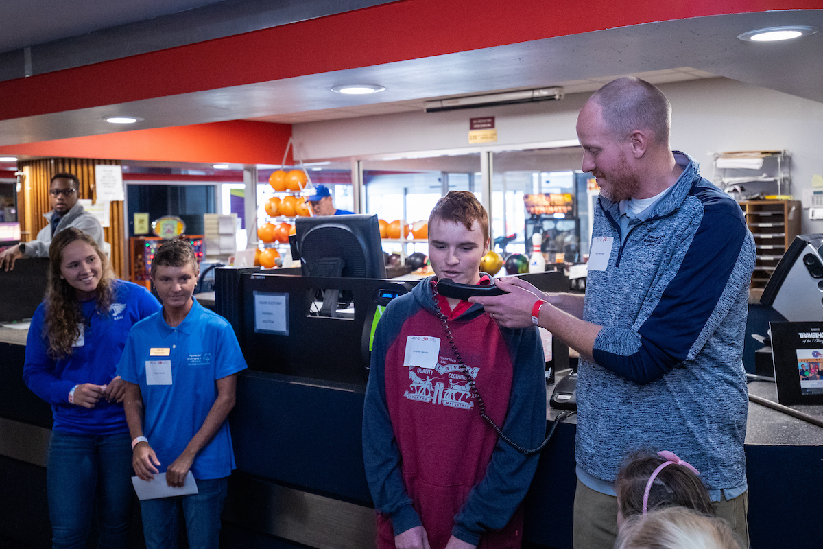 UK athletes bowl with members of Special Olympics at Collins Bowling Alley on , Saturday Dec. 8, 2018  in Lexington, Ky. Photo by Mark Mahan