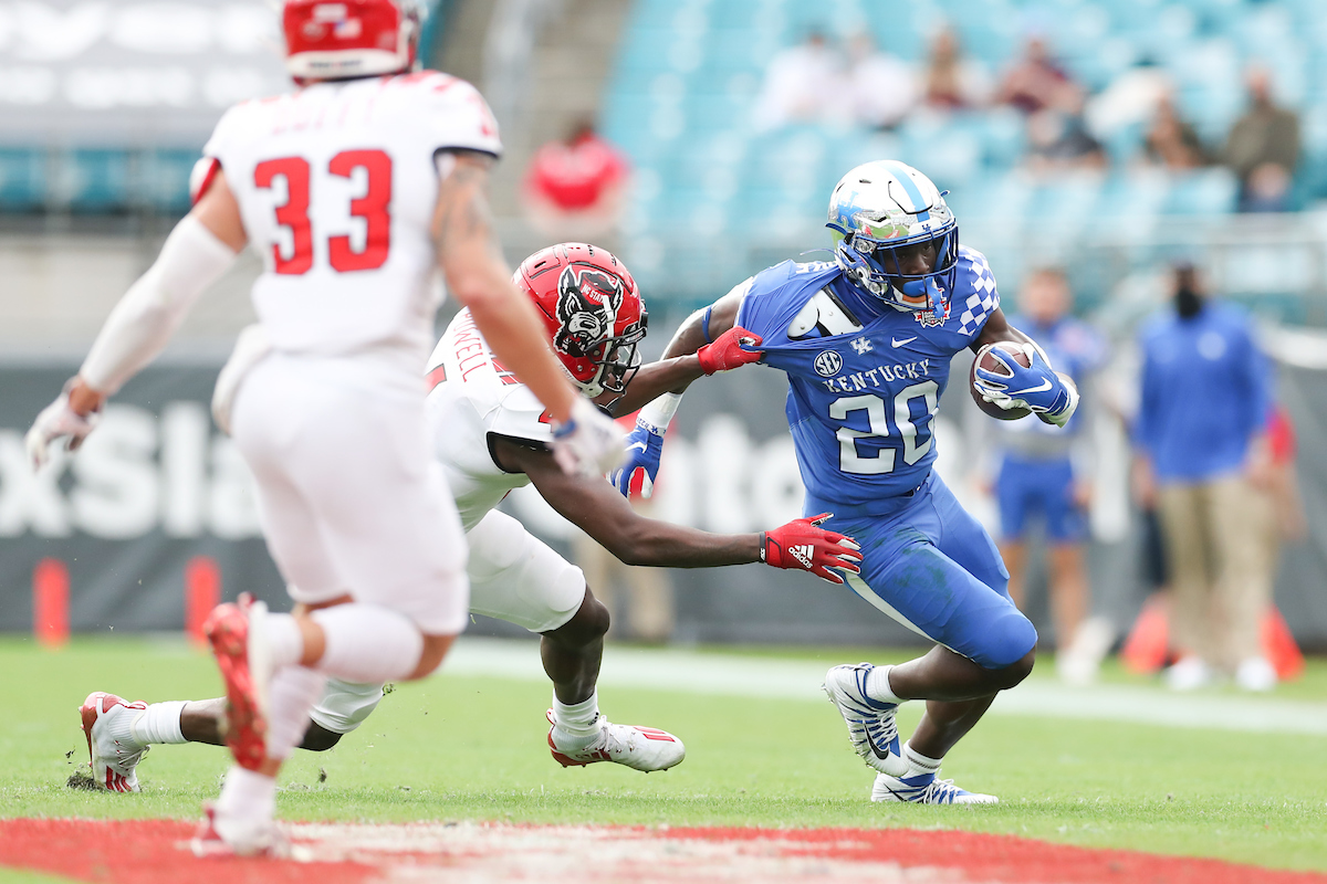 KAVOSIEY SMOKE.

Kentucky beats NC State, 23-21, to win the TaxSlayer Gator Bowl.

Photo by Elliott Hess | UK Athletics