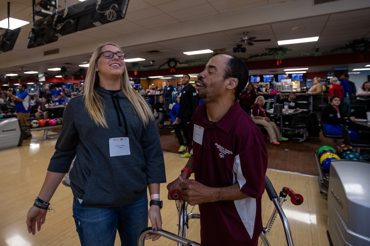 UK athletes bowl with members of Special Olympics at Collins Bowling Alley on , Saturday Dec. 8, 2018  in Lexington, Ky. Photo by Mark Mahan