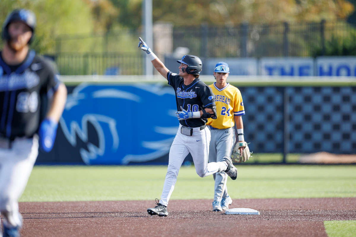 A picture of J.T. Peltier waving to the crowd after a home run