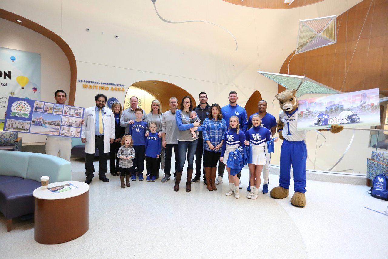 Sarah Howard and her family are presented with a vacation trip to the 2019 VRBO Citrus Bowl to cheer on the Kentucky Wildcats.

Photo by Noah J. Richter | UK Athletics