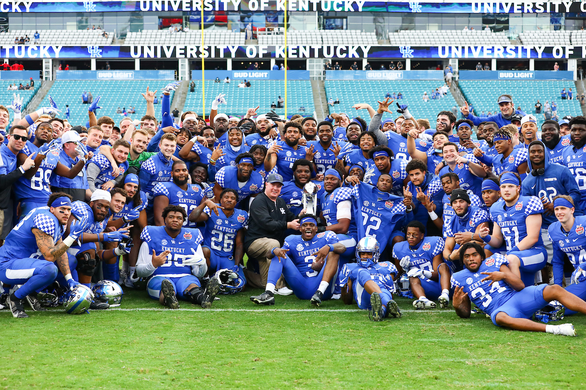 TEAM. 

Kentucky beats NC State, 23-21, to win the TaxSlayer Gator Bowl.

Photo by Elliott Hess | UK Athletics
