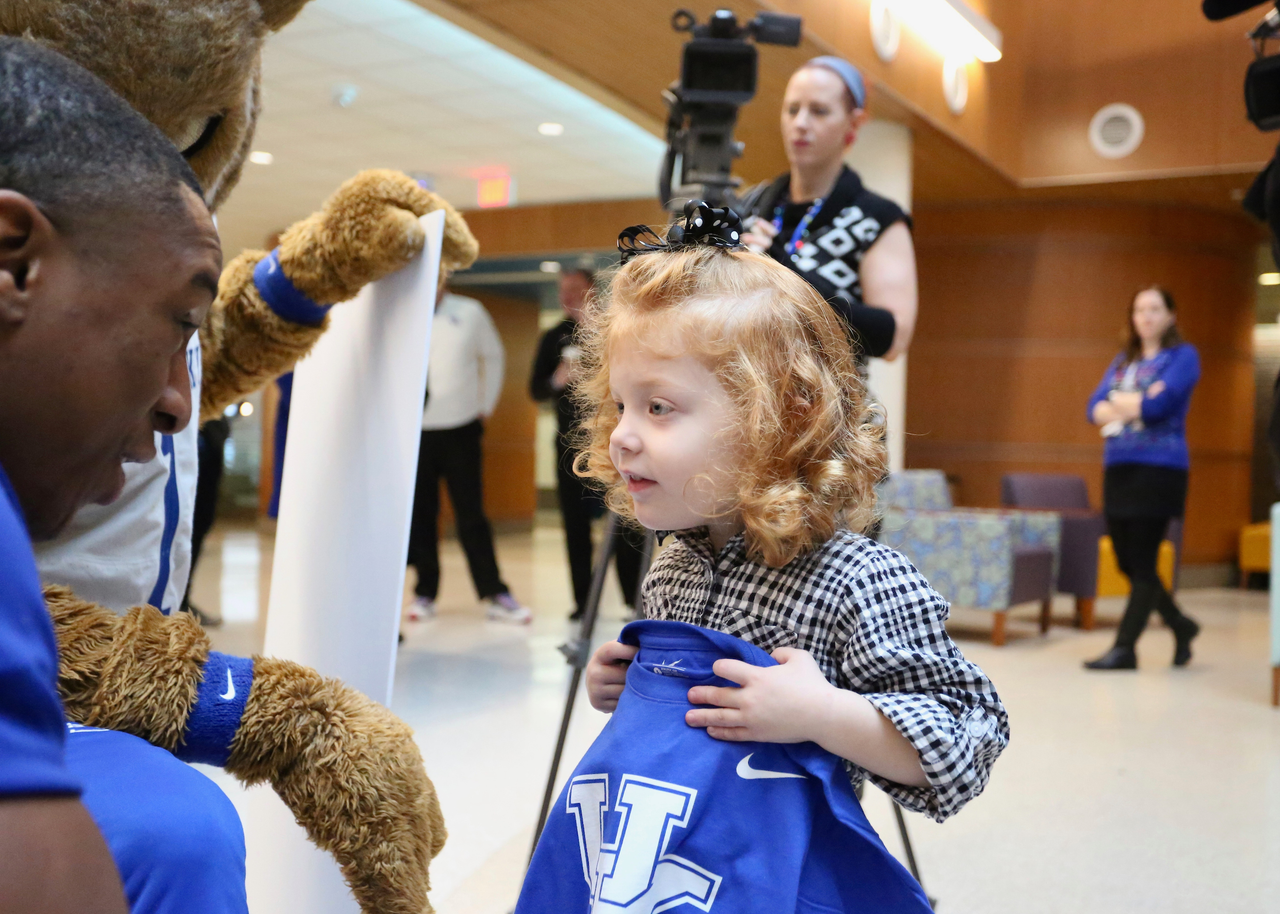 Sarah Howard and her family are presented with a vacation trip to the 2019 VRBO Citrus Bowl to cheer on the Kentucky Wildcats.

Photo by Noah J. Richter | UK Athletics