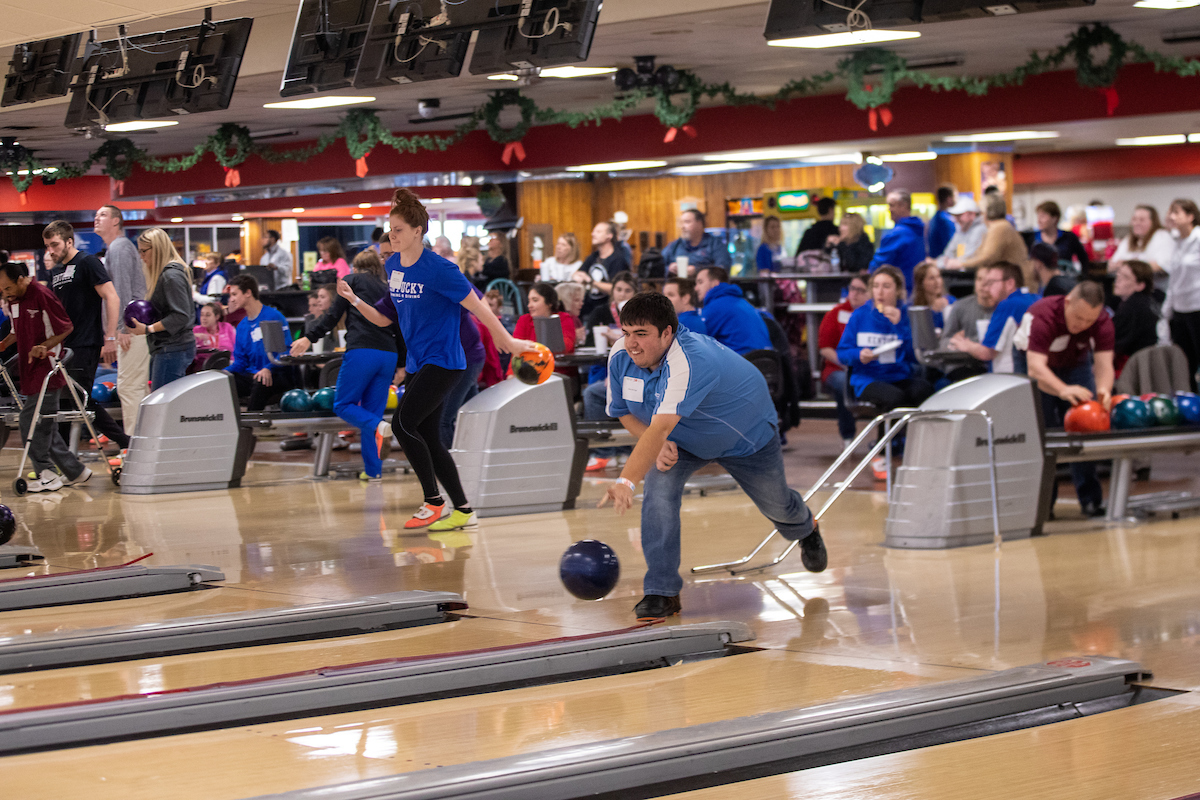 UK athletes bowl with members of Special Olympics at Collins Bowling Alley on , Saturday Dec. 8, 2018  in Lexington, Ky. Photo by Mark Mahan
