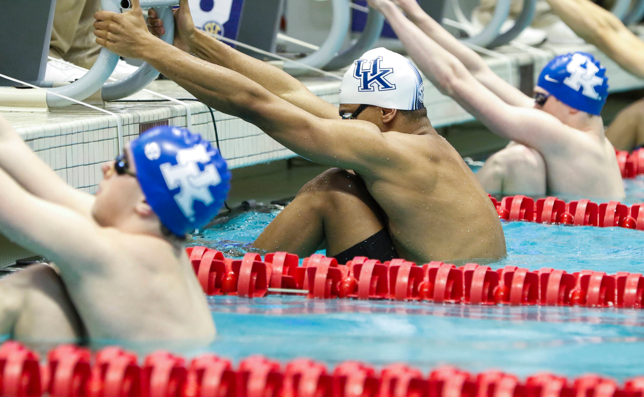 (From left to right) Connor Blandford, Alex Taylor and David Dingess get ready before the start of the men's 200 yard backstroke during the final day of the 2019 SEC Swimming and Diving Championships in the Gabrielsen Natatorium at the University of Georgia in Athens, Ga., on Saturday, Feb. 23, 2019. (Casey Sykes)