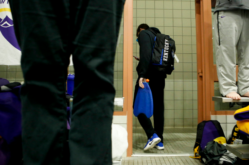 A Kentucky swimmer walks out before a break during the final day of the 2019 SEC Swimming and Diving Championships in the Gabrielsen Natatorium at the University of Georgia in Athens, Ga., on Saturday, Feb. 23, 2019. (Casey Sykes)