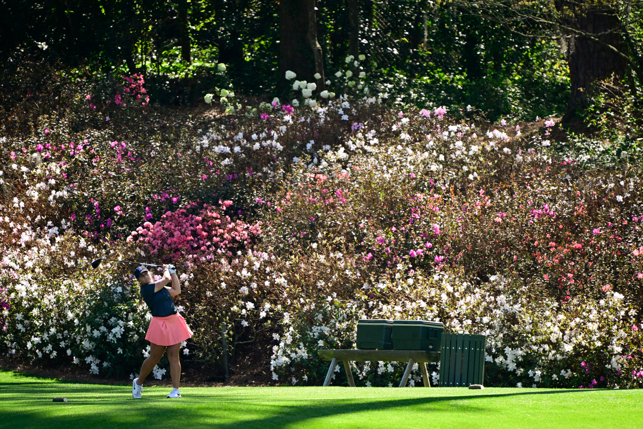 Jensen Castle of the United States plays her stroke from the No. 13 tee during a practice round for the Augusta National Women's Amateur at Augusta National Golf Club, Friday, April 1, 2022.