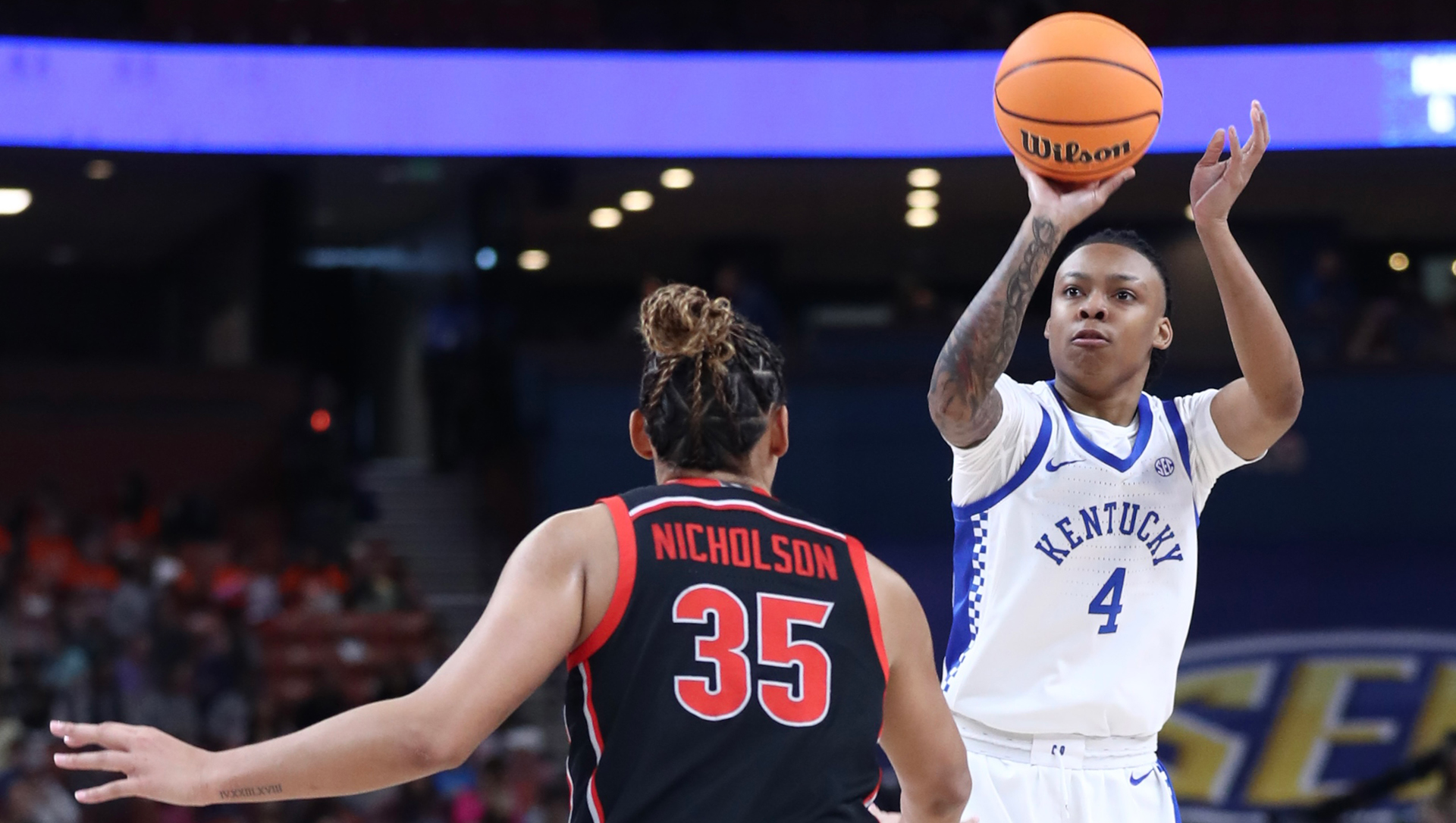Russell, Petty Lead Kentucky Past Georgia in SEC Tournament Opener