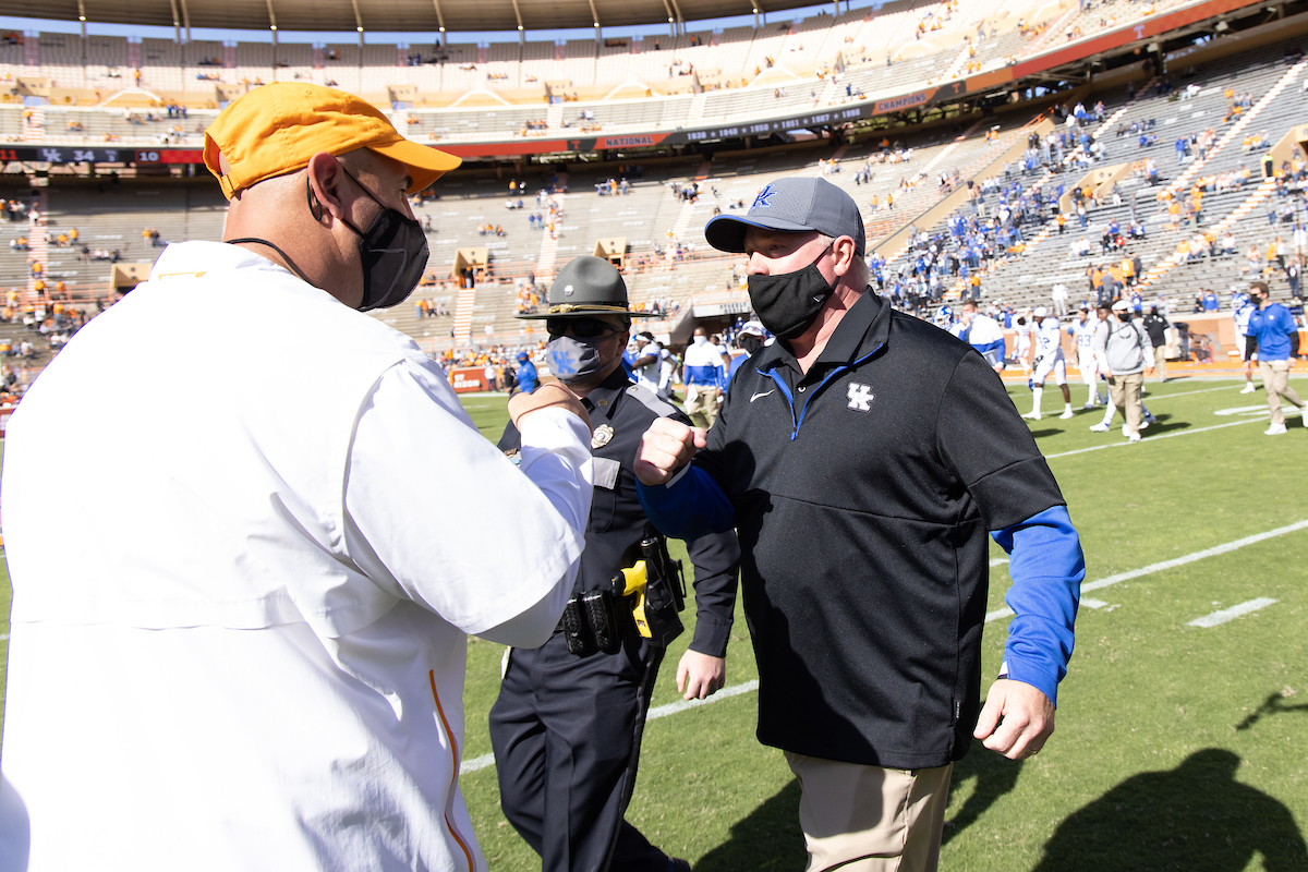 Coach Stoops. Coach Pruitt.

Kentucky beats Tennessee, 34-7.

Photo by Elliott Hess | UK Athletics