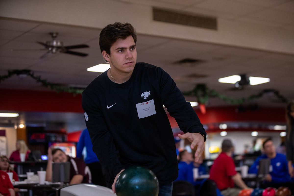 UK athletes bowl with members of Special Olympics at Collins Bowling Alley on , Saturday Dec. 8, 2018  in Lexington, Ky. Photo by Mark Mahan