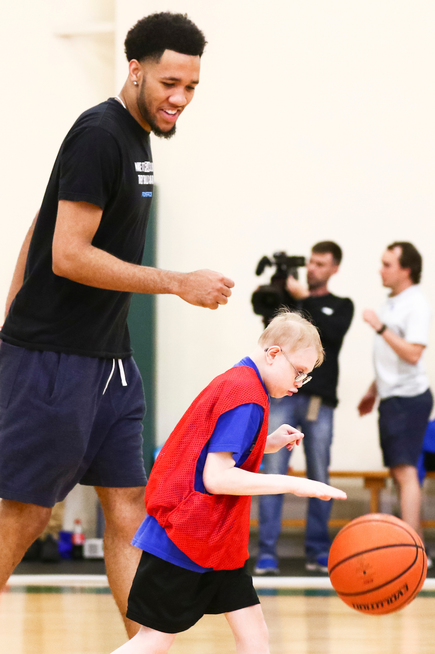 EJ Montgomery. 

EJ Montgomery and Immanuel Quickley play basketball with with kids during a camp at Winstar Farm on Thursday, June 20th. 

Photo by Eddie Justice | UK Athletics