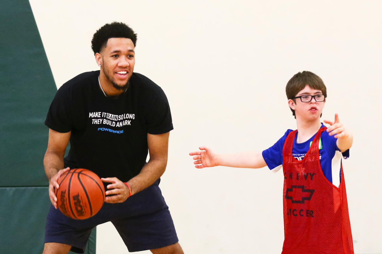 EJ Montgomery. Fan. 

EJ Montgomery and Immanuel Quickley play basketball with with kids during a camp at Winstar Farm on Thursday, June 20th. 

Photo by Eddie Justice | UK Athletics